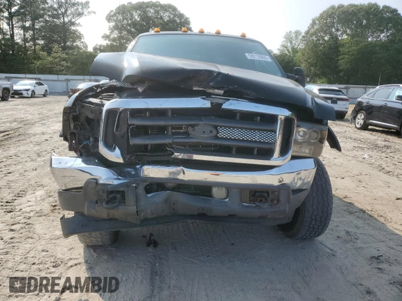 2002 Ford F-350 XL with VIN 1FTSW31S22EA86524, listed as a Copart auction lot 59212805 with 193,901 mi miles and Salvage title. Bid and sale history available at DreamBid. Image 5.