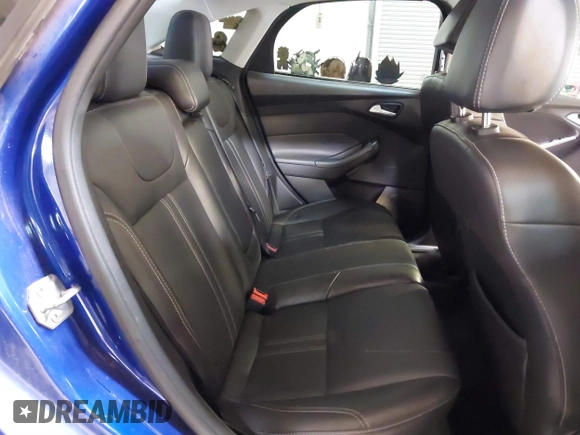 2014 Ford Focus SE with VIN 1FADP3F21EL194900, listed as a IAAI auction lot 41341333 with 103,245 mi miles. Bid and sale history available at carsss.com. Image 8.