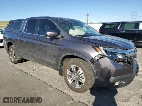 2019 Honda Ridgeline RTL-T with VIN 5FPYK3F67KB027637, listed as a Copart auction lot 53324325 with 70,801 mi miles and Salvage title. Bid and sale history available at DreamBid. Image 4.
