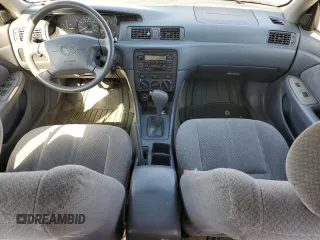 2000 Toyota Camry CE z VIN 4T1BG22K2YU711908, wystawiony jako Copart lot #56294515 z przebiegiem 110 871 mil mil oraz Szkoda całkowita • Salvage title. Historia ofert i sprzedaży dostępna na DreamBid. Obrazek 8.