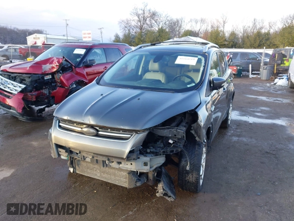2015 Ford Escape Titanium with VIN 1FMCU0J92FUB74972, listed as a IAAI auction lot 41164519 with 228,785 mi miles and . Bid and sale history available at DreamBid. Image 17.