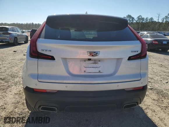 2023 Cadillac XT4 FWD Luxury with VIN 1GYAZAR43PF122536, listed as a Copart auction lot 54873925 with 67,775 mi miles and Salvage Title. Bid and sale history available at carsss.com. Image 6.