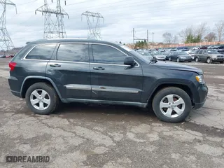 2011 Jeep Grand Cherokee Laredo with VIN 1J4RR4GG7BC721483, listed as a IAAI auction lot 41810180 with 181,558 mi miles. Bid and sale history available at carsss.com. Image 14.
