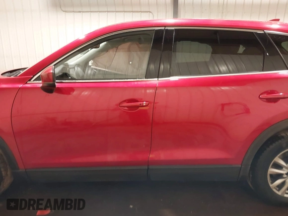 2017 Mazda CX-9 Touring z VIN JM3TCBCY2H0131659, wystawiony jako IAAI lot #41674239 z przebiegiem 168 129 mil mil oraz . Historia ofert i sprzedaży dostępna na DreamBid. Obrazek 14.