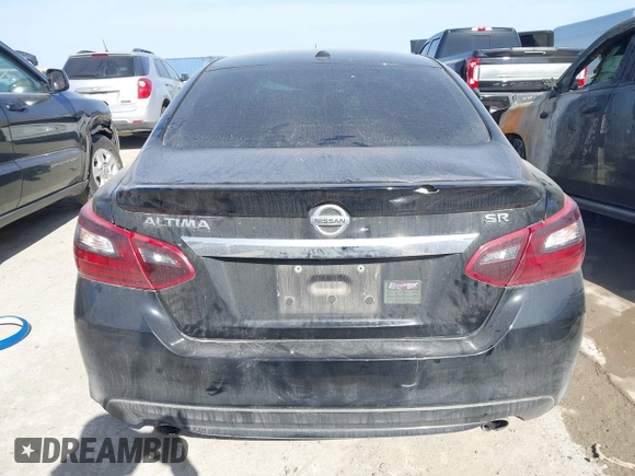 2018 Nissan Altima 2.5 SR with VIN 1N4AL3AP4JC284490, listed as a IAAI auction lot 41795563 with 112,936 mi miles. Bid and sale history available at carsss.com. Image 16.