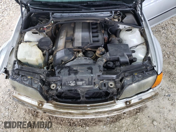 2000 BMW 3 Series 323i with VIN WBAAM3348YFP73443, listed as a Copart auction lot 54165575 with 334,761 mi miles and Salvage title. Bid and sale history available at DreamBid. Image 11.