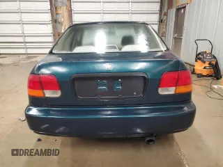 1997 Honda Civic DX with VIN 1HGEJ6529VL024076, listed as a Copart auction lot 74904484 with 203,570 mi miles and Salvage Title. Bid and sale history available at carsss.com. Image 6.