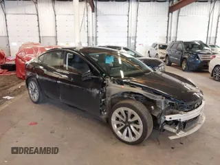 2022 Tesla Model 3 with VIN 5YJ3E1EA4NF187113, listed as a IAAI auction lot 41712331 with 81,879 mi miles. Bid and sale history available at carsss.com. Image 1.