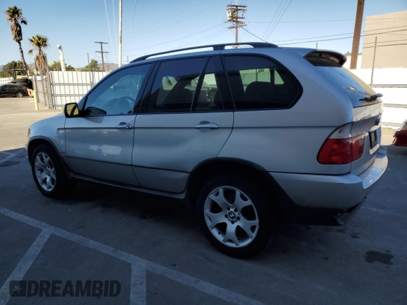2000 BMW X5 4.4i with VIN WBAFB3355YLH05741, listed as a Copart auction lot 79973414 with 138,936 mi miles and Clean Title. Bid and sale history available at carsss.com. Image 2.