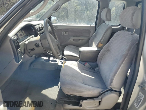 2002 Toyota Tacoma z VIN 5TEVL52N72Z007081, wystawiony jako Copart lot #52008995 z przebiegiem 218 910 mil mil oraz Szkoda całkowita • Salvage title. Historia ofert i sprzedaży dostępna na DreamBid. Obrazek 7.
