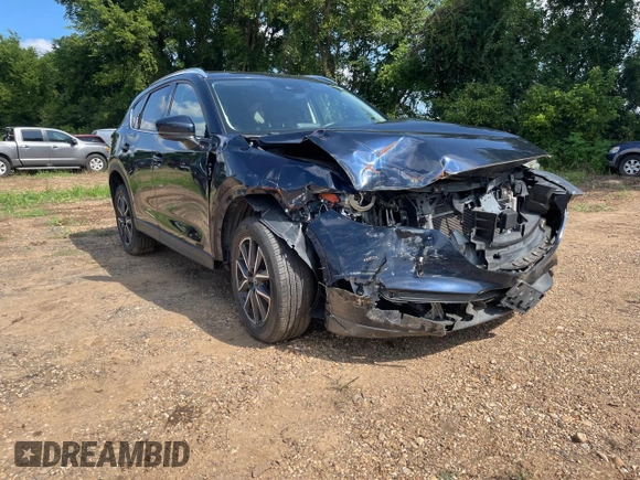 2018 Mazda CX-5 Grand Touring with VIN JM3KFBDMXJ1391984, listed as a Copart auction lot 65138665 with 97,244 mi miles and Clean title. Bid and sale history available at DreamBid. Image 1.