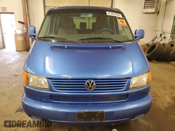 2003 Volkswagen EuroVan с VIN WV2KB47053H044308, выставлен на аукционе Copart как лот 81267494 с пробегом 174 679 миль миль и Чистый • Clean title. История ставок и продаж доступна на DreamBid. Изображение 5.