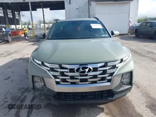 2022 Hyundai Santa Cruz SEL z VIN 5NTJCDAE8NH024149, wystawiony jako IAAI lot #42197663 z przebiegiem 51 491 mil mil oraz . Historia ofert i sprzedaży dostępna na DreamBid. Obrazek 12.