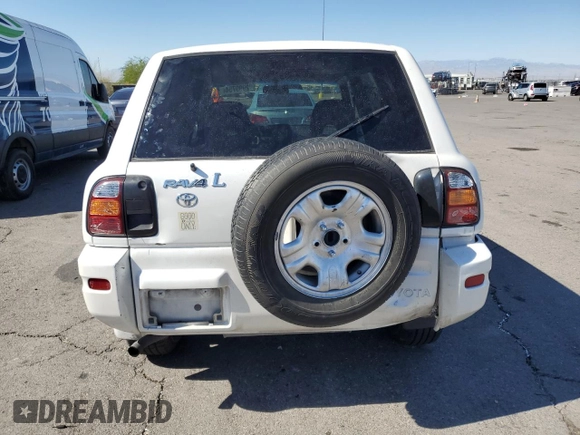 2000 Toyota RAV4 with VIN JT3HP10V0Y7164016, listed as a Copart auction lot 72999754 with 215,880 mi miles and Salvage Title. Bid and sale history available at carsss.com. Image 6.
