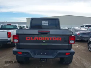 2023 Jeep Gladiator Sport S z VIN 1C6HJTAG9PL554845, wystawiony jako IAAI lot #41312360 z przebiegiem 18 077 mil mil oraz . Historia ofert i sprzedaży dostępna na DreamBid. Obrazek 17.