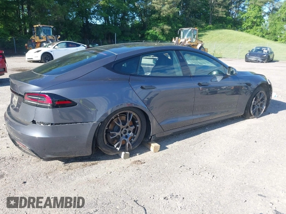 2022 Tesla Model S with VIN 5YJSA1E57NF479056, listed as a IAAI auction lot 42091009 with 78,272 mi miles and . Bid and sale history available at DreamBid. Image 6.