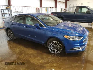 2017 Ford Fusion Titanium z VIN 3FA6P0D99HR162354, wystawiony jako Copart lot #61753395 z przebiegiem 100 678 mil mil oraz Szkoda całkowita • Salvage title. Historia ofert i sprzedaży dostępna na DreamBid. Obrazek 4.
