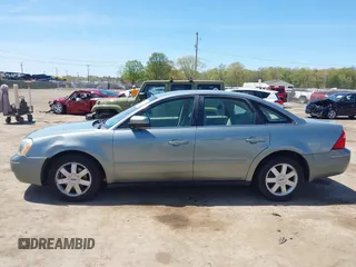 2005 Ford Five Hundred SE z VIN 1FAFP23185G168799, wystawiony jako IAAI lot #42202907 z przebiegiem Nie podano mil oraz . Historia ofert i sprzedaży dostępna na DreamBid. Obrazek 14.