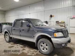 2002 Ford F-150 XLT with VIN 1FTRW08L12KE11970, listed as a Copart auction lot 45299665 with 173,802 mi miles and Salvage Title. Bid and sale history available at carsss.com. Image 4.