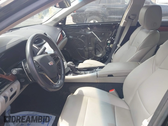 2016 Cadillac CTS RWD with VIN 1G6AP5SX0G0118831, listed as a IAAI auction lot 42105091 with 123,507 mi miles and . Bid and sale history available at DreamBid. Image 5.
