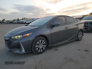 2022 Toyota Prius LE z VIN JTDKAMFP0N3228104, wystawiony jako Copart lot #53857565 z przebiegiem 39 543 mil mil oraz Szkoda całkowita • Salvage title. Historia ofert i sprzedaży dostępna na DreamBid. Obrazek 1.