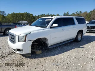 2015 GMC Yukon XL SLT with VIN 1GKS1HKC5FR255473, listed as a Copart auction lot 88680595 with 198,265 mi miles and Salvage Title. Bid and sale history available at carsss.com. Image 1.