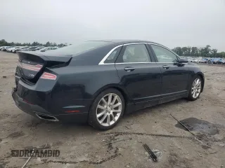 2014 Lincoln MKZ with VIN 3LN6L2J97ER817852, listed as a Copart auction lot 60980885 with 77,194 mi miles and Salvage title. Bid and sale history available at DreamBid. Image 3.