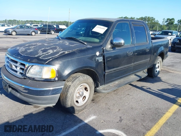 2001 Ford F-150 XLT z VIN 1FTRW07L61KC53030, wystawiony jako IAAI lot #42526499 z przebiegiem 121 675 mil mil oraz . Historia ofert i sprzedaży dostępna na DreamBid. Obrazek 2.