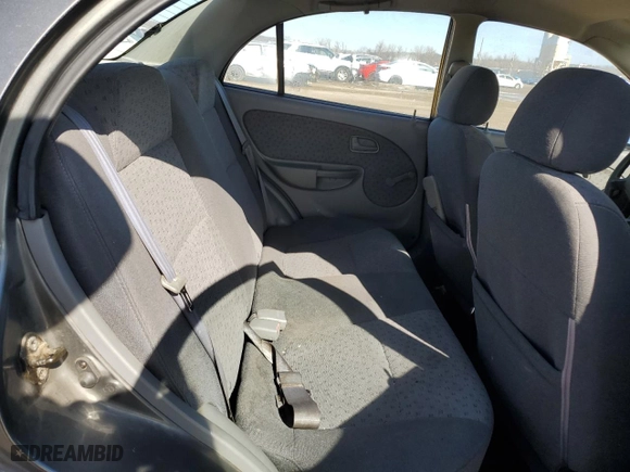 2005 Kia Rio with VIN KNADC125956396521, listed as a Copart auction lot 46463415 with 152,174 mi miles and Salvage Title. Bid and sale history available at carsss.com. Image 10.
