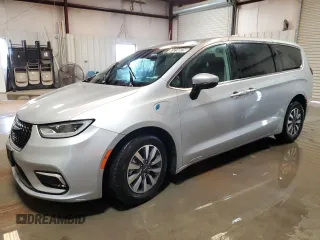 2023 Chrysler Pacifica Hybrid Touring L with VIN 2C4RC1L79PR618138, listed as a Copart auction lot 61216675 with 50,486 mi miles and Clean title. Bid and sale history available at DreamBid. Image 1.