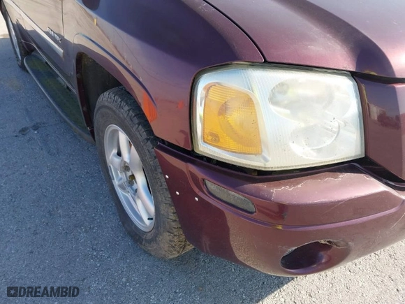2006 GMC Envoy SLE with VIN 1GKDT13S762328884, listed as a IAAI auction lot 41778198 with 1 mi miles. Bid and sale history available at carsss.com. Image 6.