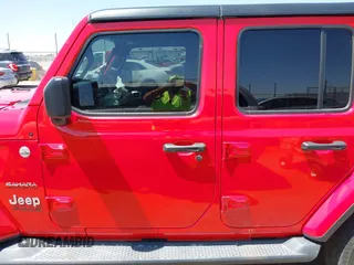 2019 Jeep Wrangler Unlimited Sahara with VIN 1C4HJXEN8KW591398, listed as a IAAI auction lot 42045071 with 87,410 mi miles and . Bid and sale history available at DreamBid. Image 14.