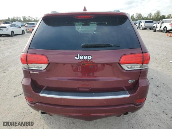 2017 Jeep Grand Cherokee Overland with VIN 1C4RJECG3HC868255, listed as a Copart auction lot 83041054 with 121,604 mi miles and Salvage Title. Bid and sale history available at carsss.com. Image 6.