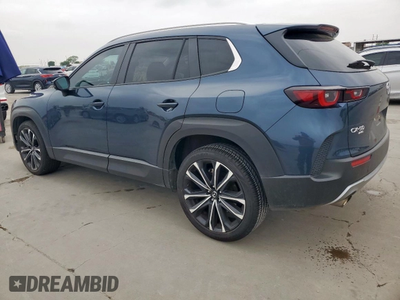 2023 Mazda CX-50 2.5 Turbo with VIN 7MMVABXY4PN148160, listed as a Copart auction lot 51306595 with 36,622 mi miles and Salvage title. Bid and sale history available at DreamBid. Image 2.