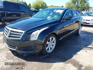 2014 Cadillac ATS Standard RWD with VIN 1G6AA5RX3E0101977, listed as a IAAI auction lot 40459124 with 125,360 mi miles. Bid and sale history available at carsss.com. Image 2.