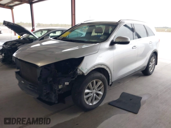 2018 Kia Sorento LX with VIN 5XYPG4A55JG360565, listed as a IAAI auction lot 41031059 with 138,963 mi miles and . Bid and sale history available at DreamBid. Image 2.