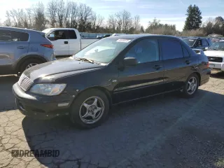 2002 Mitsubishi Lancer OZ-Rally with VIN JA3AJ86E92U027551, listed as a Copart auction lot 45020575 with 214,575 mi miles and Salvage Title. Bid and sale history available at carsss.com. Image 1.