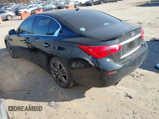 2014 Infiniti Q50 Hybrid Premium with VIN JN1AV7APXEM690577, listed as a IAAI auction lot 41493689 with 89,337 mi miles and . Bid and sale history available at DreamBid. Image 3.