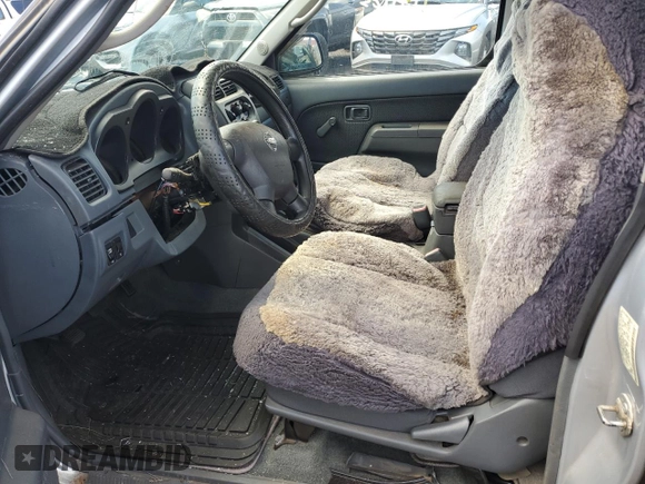 2002 Nissan Frontier SE with VIN 1N6ED27T12C300358, listed as a Copart auction lot 45379885 with 54,273 mi miles and Salvage title. Bid and sale history available at DreamBid. Image 7.