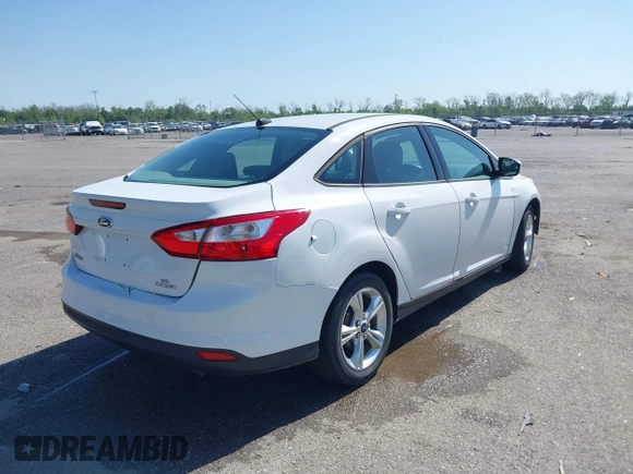2013 Ford Focus SE with VIN 1FADP3F26DL203377, listed as a IAAI auction lot 41998750 with 70,000 mi miles. Bid and sale history available at carsss.com. Image 4.