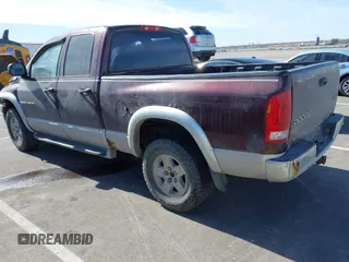 2004 Dodge 1500 SLT with VIN 1D7HU18N74J209304, listed as a IAAI auction lot 41675048 with 218,681 mi miles and . Bid and sale history available at carsss.com. Image 3.