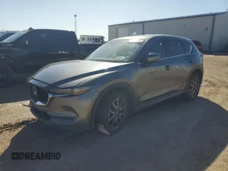 2018 Mazda CX-5 Grand Touring with VIN JM3KFADM6J0339204, listed as a Copart auction lot 48153655 with 85,900 mi miles and Clean Title. Bid and sale history available at DreamBid. Image 1.