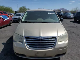 2010 Chrysler Town & Country LX with VIN 2A4RR4DE0AR188949, listed as a Copart auction lot 54140515 with 185,534 mi miles and Salvage Title. Bid and sale history available at DreamBid. Image 5.