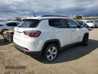 2018 Jeep Compass Latitude with VIN 3C4NJCBB7JT233848, listed as a Copart auction lot 56502715 with 94,665 mi miles and Salvage title. Bid and sale history available at DreamBid. Image 3.