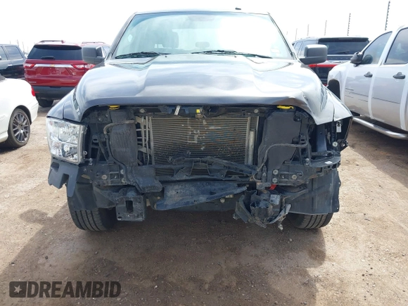 2021 Ram 1500 Tradesman z VIN 3C6RR6KG9MG563230, wystawiony jako IAAI lot #41905688 z przebiegiem 81 143 mil mil oraz . Historia ofert i sprzedaży dostępna na DreamBid. Obrazek 6.