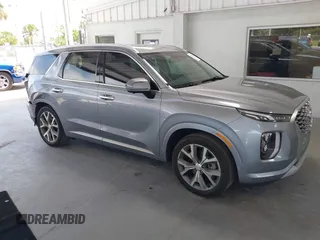 2021 Hyundai Palisade Limited z VIN KM8R54HE5MU179663, wystawiony jako IAAI lot #42312256 z przebiegiem 90 862 mil mil oraz . Historia ofert i sprzedaży dostępna na DreamBid. Obrazek 1.
