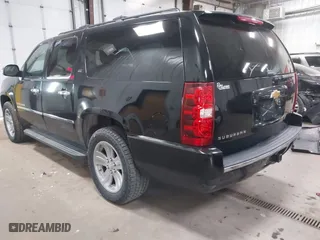 2012 Chevrolet Suburban LTZ with VIN 1GNSKKE77CR326924, listed as a IAAI auction lot 41764487 with 198,224 mi miles. Bid and sale history available at carsss.com. Image 3.