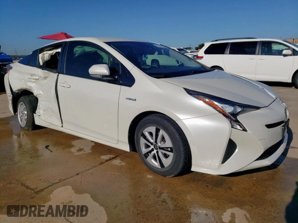 2017 Toyota Prius Two z VIN JTDKARFUXH3038947, wystawiony jako Copart lot #56379015 z przebiegiem 64 230 mil mil oraz Szkoda całkowita • Salvage title. Historia ofert i sprzedaży dostępna na DreamBid. Obrazek 4.