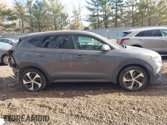 2016 Hyundai Tucson Sport with VIN KM8J33A21GU232747, listed as a IAAI auction lot 41443169 with 111,319 mi miles. Bid and sale history available at carsss.com. Image 13.