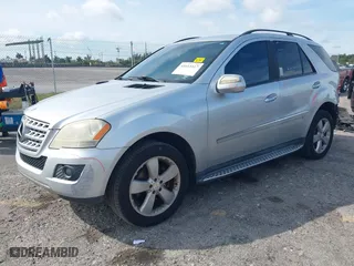 2009 Mercedes-Benz M-Class 3.5L with VIN 4JGBB86EX9A488302, listed as a IAAI auction lot 41613317 with 142,715 mi miles. Bid and sale history available at carsss.com. Image 18.